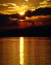 Landscape of sunset over the lake and mountains. Cloudy sky. Iznik, Bursa, Turkey Royalty Free Stock Photo