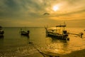 Landscape of sunset with Small Fishing Boats in Thailand Royalty Free Stock Photo