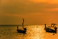 Landscape of sunset with Small Fishing Boats in Thailand Royalty Free Stock Photo