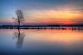 Landscape sunset or sundown river Narew Poland Europe spring time meadows under water Royalty Free Stock Photo