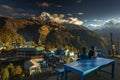 Landscape with Tadapani village on sunrise with Annapurna South, Hiunchuli and Machapuchare Fishtail Peaks in background. Himalaya Royalty Free Stock Photo