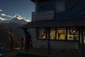 Landscape with Tadapani village on sunrise with Annapurna South, Hiunchuli and Machapuchare Fishtail Peaks in background. Himalaya