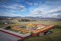 Landscape of the Tagong Temple under a blue cloudy sky in Tagong, China