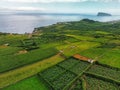 Landscape of Terceira Island in Azores with Ilheu das Cabras in background