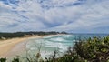 Landscape of Treachery Heaads surrounded by the sea and greenery in Australia