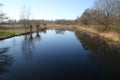 Landscape and trees mirroring in the surface water Royalty Free Stock Photo