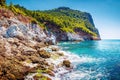 Landscape of tropical rocky coastline on sunny summer clear day. Mountain on sea beach. Tropic nature Royalty Free Stock Photo