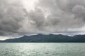 Landscape with tropical sea, monsoon storm heavy clouds and tropical Koh Chang island on horizon in Thailand Royalty Free Stock Photo