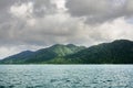 Landscape with tropical sea, monsoon storm heavy clouds and tropical Koh Chang island on horizon in Thailand Royalty Free Stock Photo