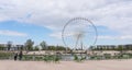 Landscape of Tuileries garden with Ferris wheel in Paris, France. Tuileries Garden is a public garden located between