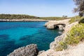 Landscape with turquoise, azure sea water on a sunny day, Cala Mondrago, Majorca island, Spain Royalty Free Stock Photo