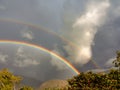 Two rainbows on a stormy sky Royalty Free Stock Photo