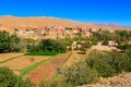 Landscape of a typical moroccan berber village with oasis in the Royalty Free Stock Photo