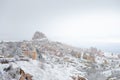 Landscape of Uchisar Castle from Pigeon Valley with snow in the winter season at Cappadocia in Turkey Royalty Free Stock Photo