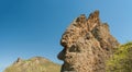 Landscape with unusual rock shape similar to human face profile on Karadag volcanic mountain range located in Crimean peninsula Royalty Free Stock Photo