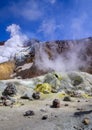 Landscape The valley of fumarol with emissions of steam of the boiling water and sulfur.