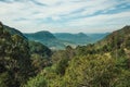 Landscape of valley with hills covered by forests