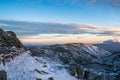 Road in Serra da Estrela Natural Park with aerial view of colorful sunset and valley between snowy mountains where CovÃÂ£o de Ferro Royalty Free Stock Photo