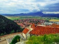 Landscape of the valley with the town, view from the top of the mountain in the Rasnov fortress Romania. Amazing panorama of the Royalty Free Stock Photo