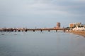 Landscape, a very early morning, empty seashore that seamlessly crosses the pier going into the sea Royalty Free Stock Photo