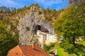 Landscape view of ancient castle in the cave. Predjama castle Slovene. Predjamski grad