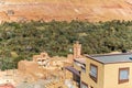 Landscape view of Atlas mountains and oasis around Douar Ait Boujane village in Todra gorge in Tinghir, Morocco.