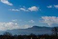 Landscape view of the beautiful blue sky over the mountain valley under the sun Royalty Free Stock Photo