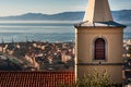 Landscape view of City of Rijeka, belfry in the front.