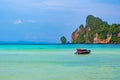 Landscape view of coastline with limestone rock and boats on ocean at Ko Phi Phi islands, Thailand. Concept of exotic tropical Royalty Free Stock Photo