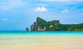 Landscape view of coastline with limestone rock and boats on ocean at Ko Phi Phi islands, Thailand. Concept of exotic tropical Royalty Free Stock Photo