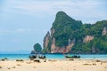 Landscape view of coastline with limestone rock and boats on ocean at Ko Phi Phi islands, Thailand. Concept of exotic tropical Royalty Free Stock Photo