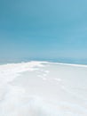 Landscape view on Dead Sea salt crystals formations, clear cyan green water at Ein Bokek beach, Israel Royalty Free Stock Photo