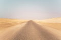 Landscape view of dusty road going far away nowhere Royalty Free Stock Photo