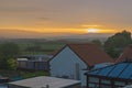 Sunrise over rural countryside village landscape Royalty Free Stock Photo