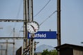 Landscape view of the Erstfeld train station clock Royalty Free Stock Photo