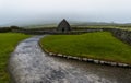 Landscape view of the Gallarus Oratory early-Christian church in County Kerry on a foggy morning