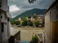 Landscape view of Ganga river having mountains & clouds at rishikesh India