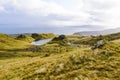 Landscape view with grass tussocks, rocks and sea of Isle of Skye, Scotland Royalty Free Stock Photo