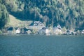 Landscape view of Hallstatt city houses with lake and Austrian Alp mountains in Salzkammergut. Royalty Free Stock Photo