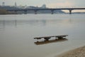 Landscape view of high water in Kyiv, spring 2023. Old wooden bench in the water. Royalty Free Stock Photo