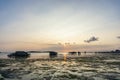 landscape view of a house by the sea and a man fishing. beautiful sunset in the evening