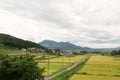 Landscape view in Iiyama of the rice paddy fields and the mountains. Royalty Free Stock Photo