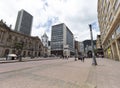 a landscape view of Jimenez avenue with 8th street corner, central bank and san francisco palace buildings at background