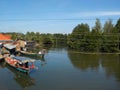 Landscape view with mangrove river with authentic local fishing boats in Asia, Cambodia