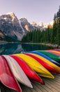 Landscape view of Moraine lake with colorful boats, Rocky Mountains Royalty Free Stock Photo