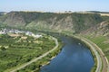 Top view on Mosel river valley and green terraced vineyards, Germany, production of quality white and red wine, riesling