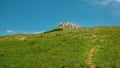 Landscape view of mountain, green grass meadow Royalty Free Stock Photo