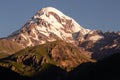 Landscape view of mountain Kazbeg on sunrise, Caucasus mountains, Country of Georgia Royalty Free Stock Photo