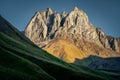 Landscape view of mountain peaks and meadows in Kazbegi, Country of Georgia