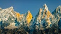 Landscape view of mountain range and peaks lit by golden sunlight, Himalayas, Nepal